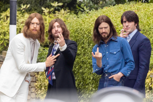 Fake Fab Four Flip Us Off
